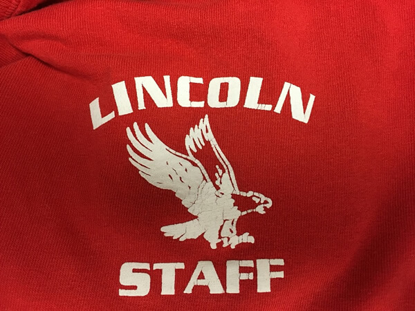 Lincoln staff shirt by D R Designs, LLC.