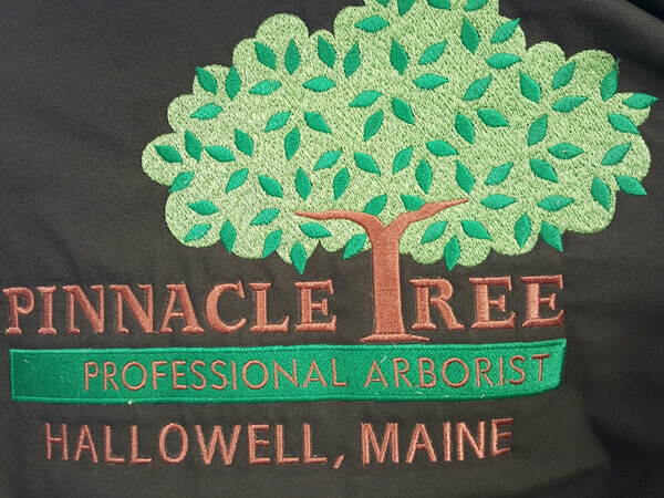 Pinnacle Tree embroidered logo by D R Designs, LLC.