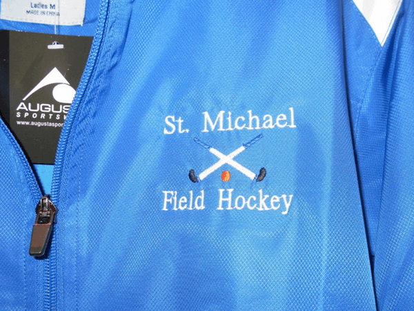 St. Michael Field Hockey embroidered logo by D R Designs, LLC.